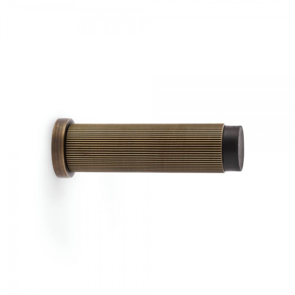 REEDED PROJECTION CYLINDER DOORSTOP - 75mm long - 5 finishes (AW602)