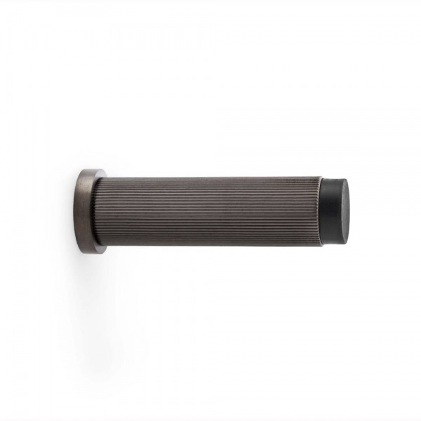 REEDED PROJECTION CYLINDER DOORSTOP - 75mm long - 5 finishes (AW602)